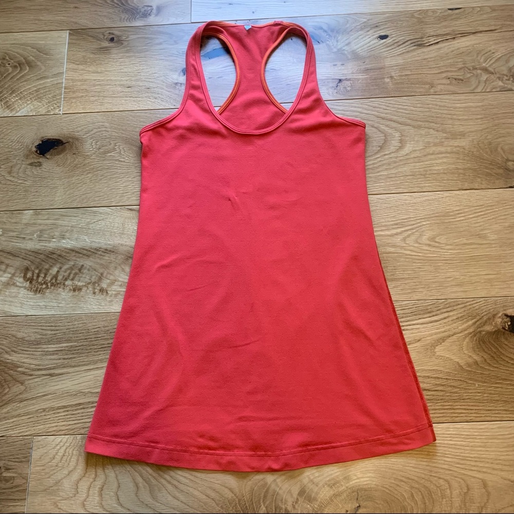 Lululemon racerback athletic tank. Size 6. Bright orange.